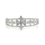 Ornate Diamond Bangle with Floral and Baguette Oval Centerpiece Diamonds House