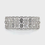 Elegant Multi-Row Diamond Bangle with Oval Clusters Diamonds House